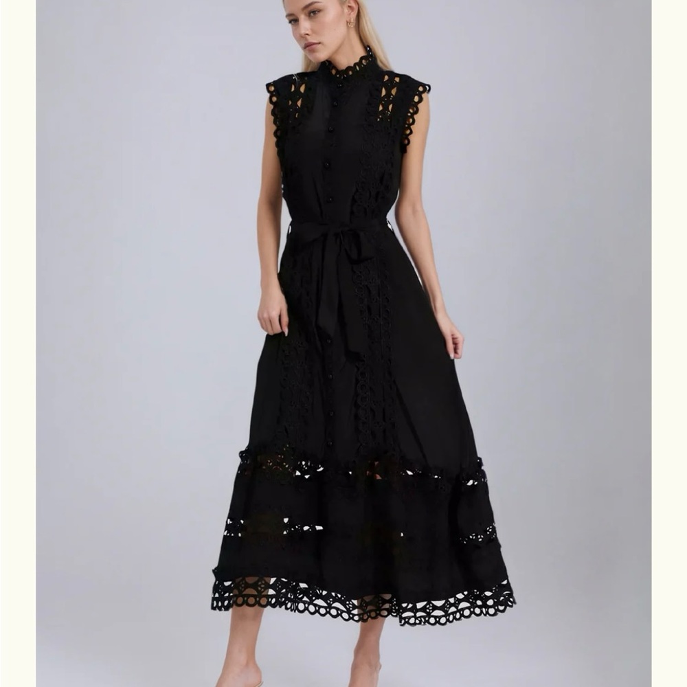 Black Sleeveless Hallow Maxi Dress
- Size S. New with tags never